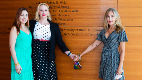 Reekie's friends and colleagues help unveil his name on the donor wall