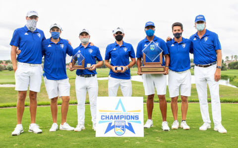 Men's golf pose with their Sunshine State Conference trophy