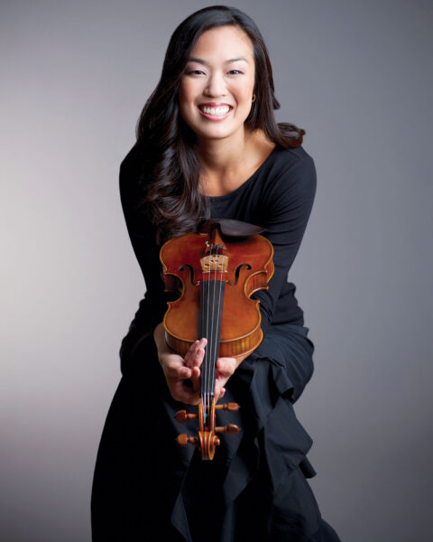 Sylvia Kim Kilcullen '05 poses with the violin
