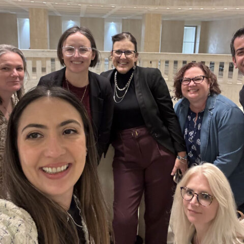 Ali Cunningham takes a group selfie at the Day on the Hill event.