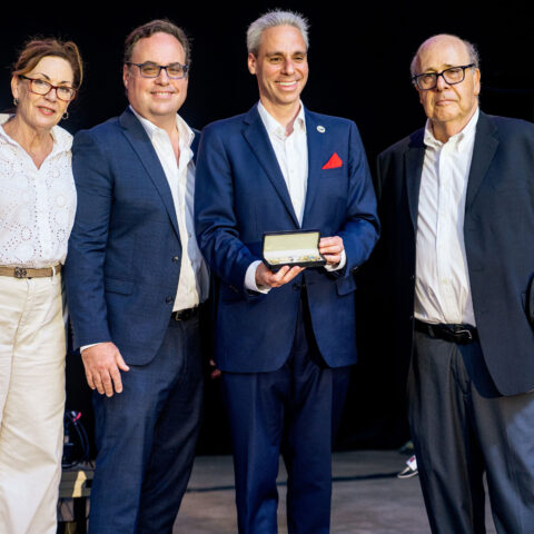 Santalo, Cambia and Phillips receive keys to the city of Boca in a group photo with the mayor.