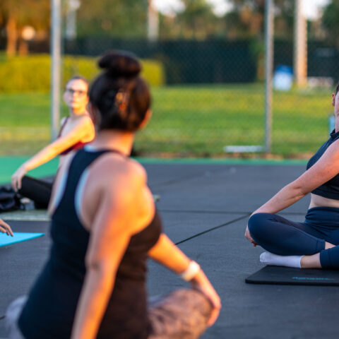 Students practice yoga on Lynn campus.