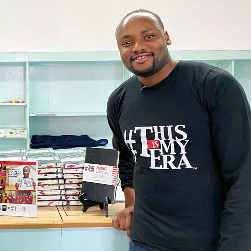 Kuda Biza with planner notebooks from #ThisIsMyEra, a company he co-founded.company