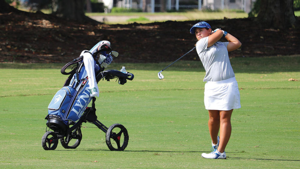Krissy Ortiz plays golf
