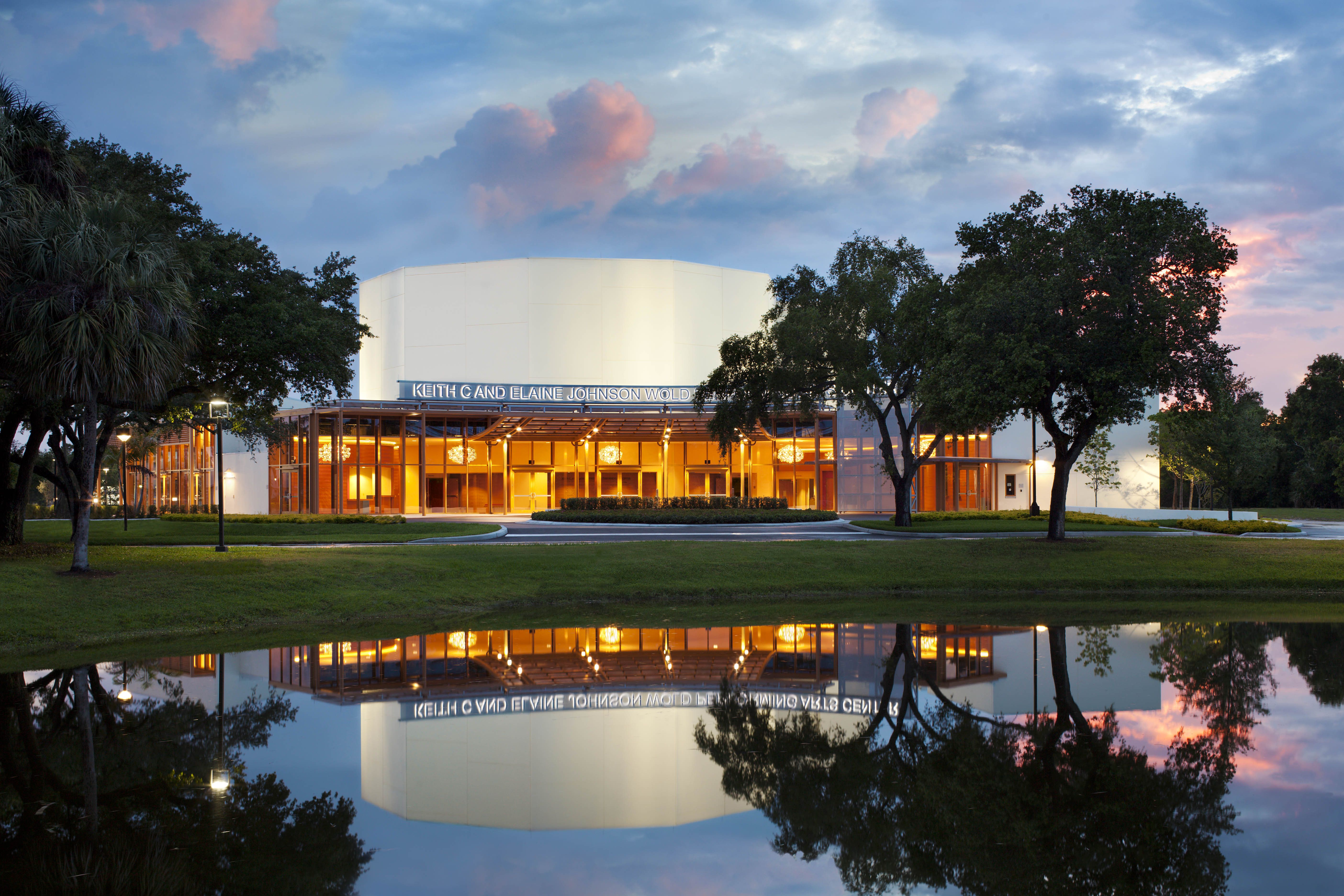 Front of the Wold Performing Arts Center at dusk.