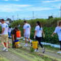 Students participating in Lynn's Citizenship Project by cleaning up areas in Boca Raton.