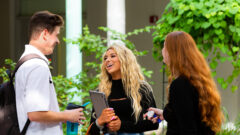 Students chat with each other in the ASSAF courtyard.