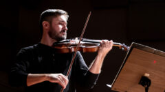 Lynn Conservatory alum Edgar Liete '06, '09 performs on his violin.
