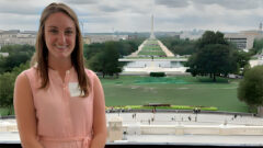 Meghan Studer '13, '15 takes a picture in front of the Washington Monument in Washington, D.C.