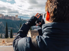 Student taking picture of landscape in Spain while studying abroad