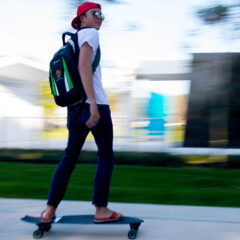 Lynn student speeds across campus on his skateboard
