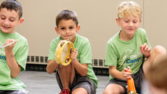 Campers use musical instruments during Pine Tree Camps.