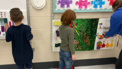 Students enjoy sensory walls at Whispering Pines Elementary.