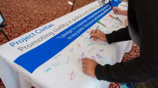 Students sign the Civility Pledge.