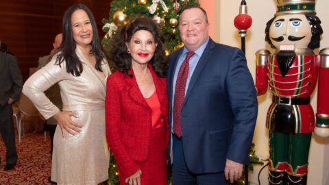 Katrina Carter-Tellison, Christine E. Lynn and Chris Boniforti at the President's Holiday Party.