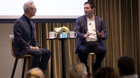 Bruce Himelstein and Andres Barry speak on stage during C-Suite Speaker Event