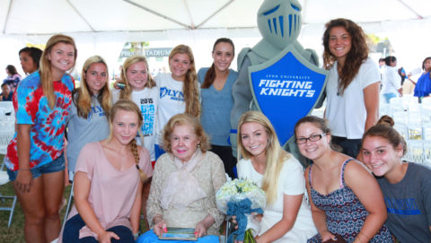 Mary Perper with the Lynn softball team at the dedication of the Perper Intramural Field