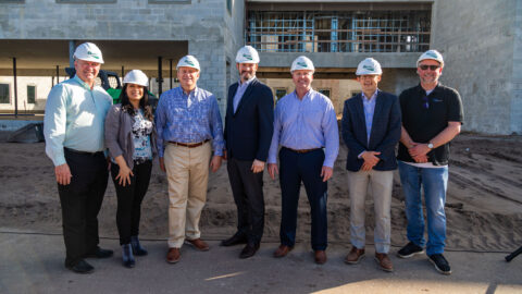 Capstone topping-off ceremony group pic