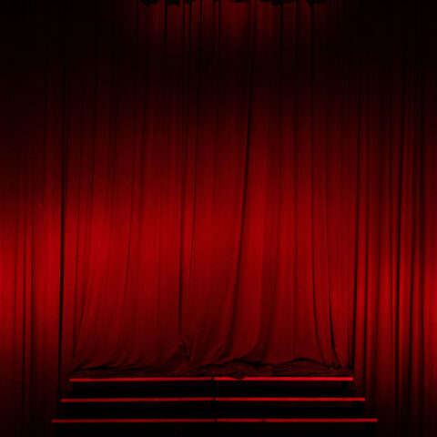 The red curtain at the Keith C. and Elaine Johnson Wold Performing Arts Center