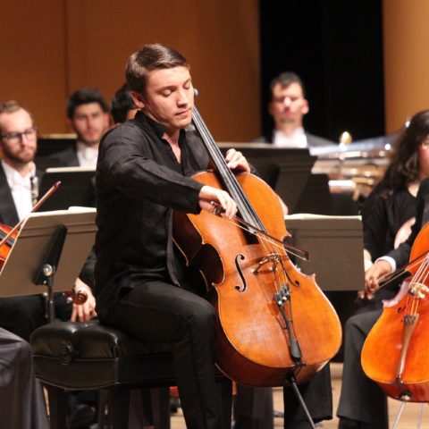 Bachelor of Music students perform string instruments in concert.