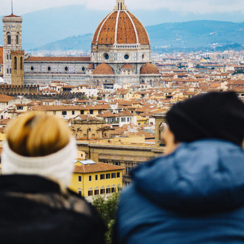 Two students take in a panoramic view of Florence, Italy, from the Piazzale Michelangelo lookout point, just south of the city.