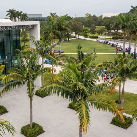Christine E. Lynn University Center from the outside with students walking.
