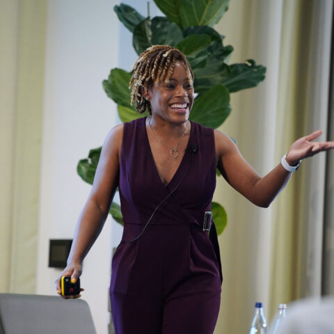 Alumna Tanesha Moody speaking at an event.
