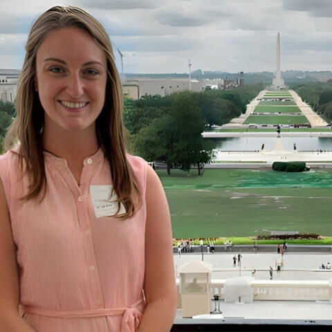 Meghan Studer '13, '15 takes a picture in front of the Washington Monument in Washington, D.C.
