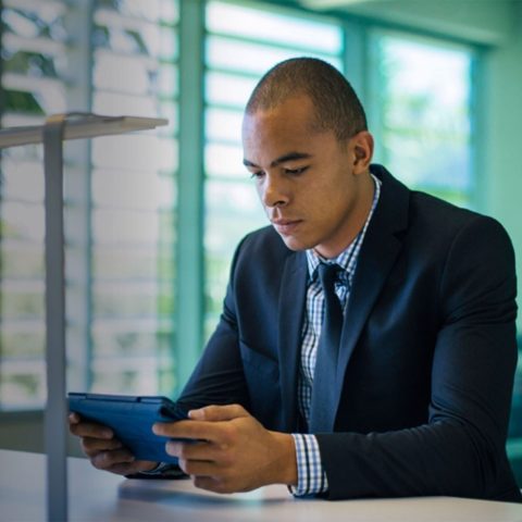 A graduate student studying on the iPad