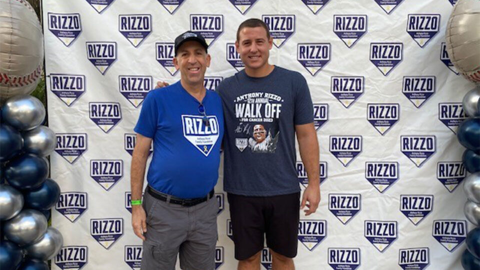 William Levy, campus safety officer, and Anthony Rizzo, first baseman for the New York Yankees, stand together at the annual Walk-off for Cancer event in Parkland.