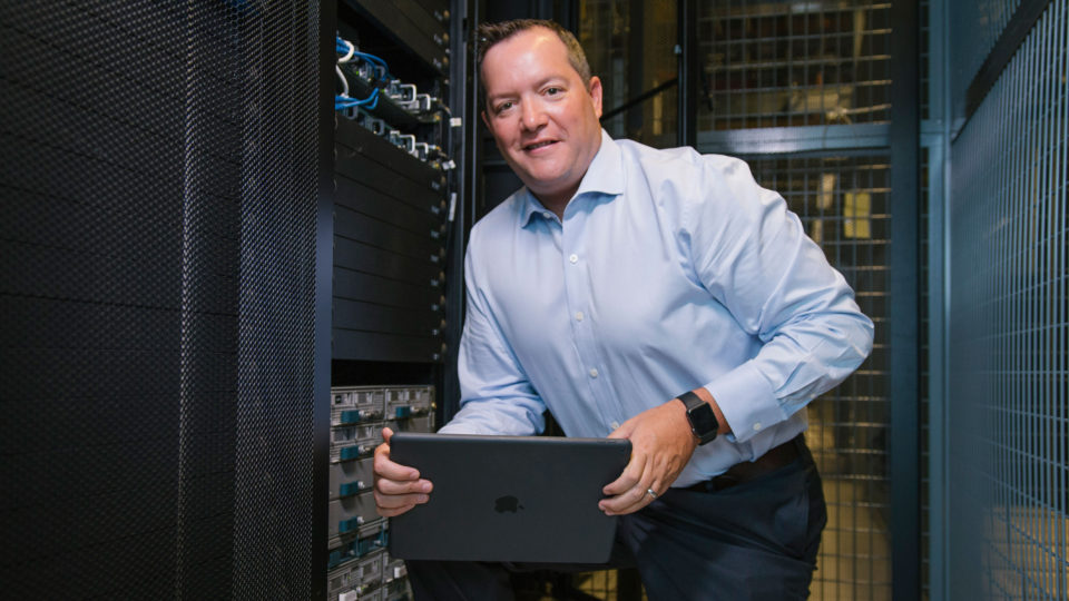 Chris Boniforti poses at Equinix, Lynn's data storage partner facility.
