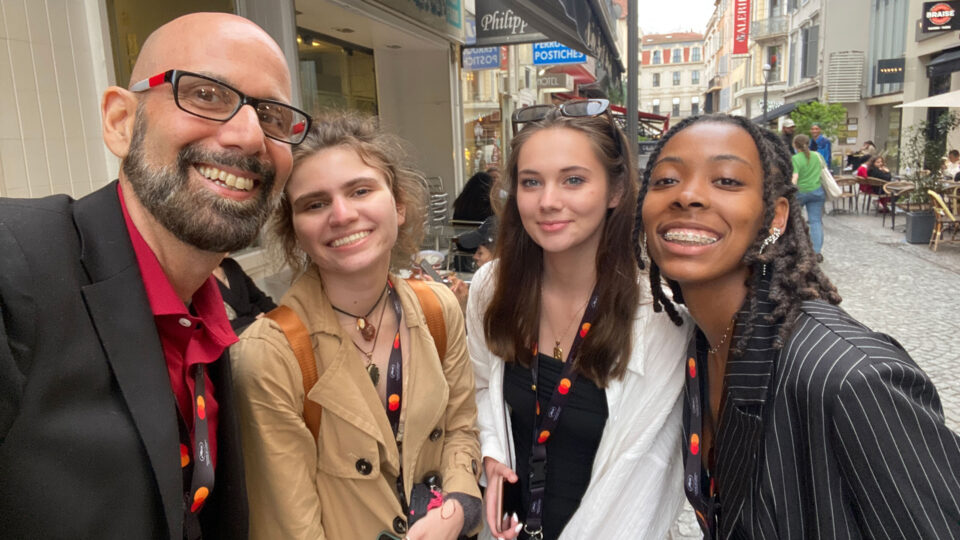 Ben Orifici and Lynn students in the streets of France.