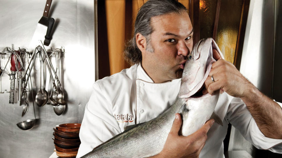 Jose Duarte, chef, kisses fish.