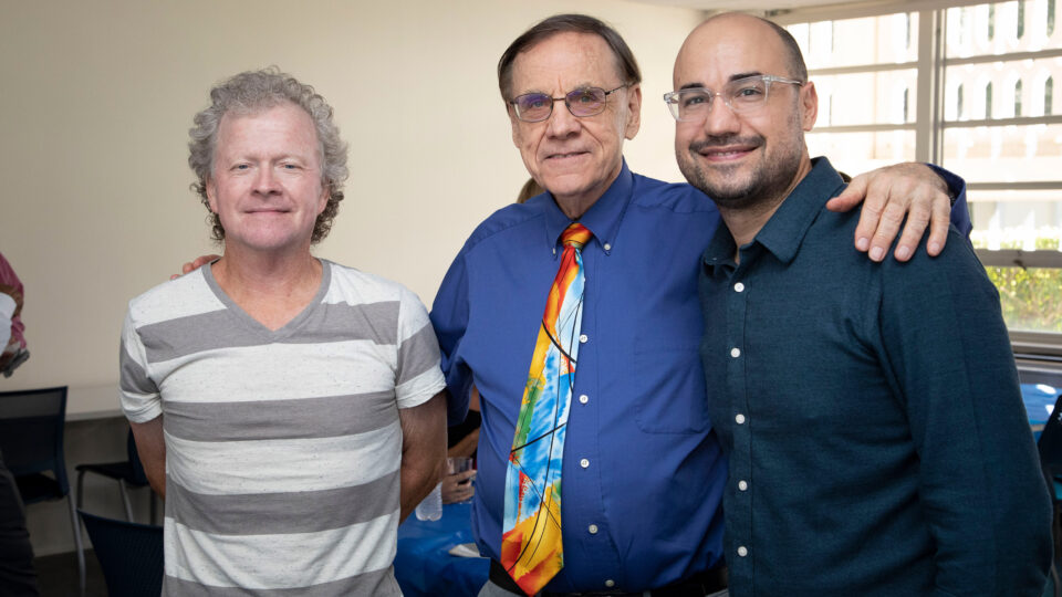 Jon Sperry with his father Len and Lynn professor Mark Jackson.