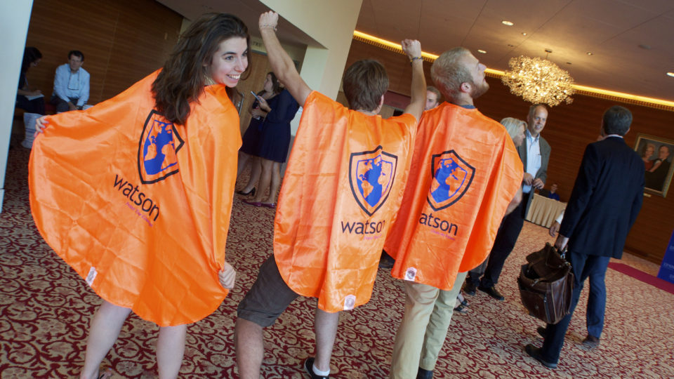 Students wear Watson's signature capes at the Wold.